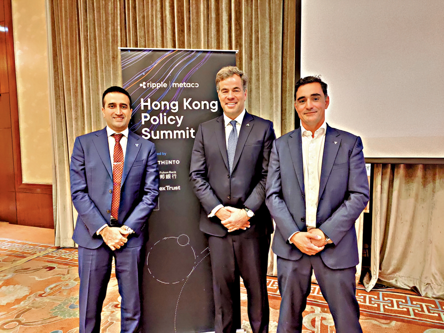 　　圖：左起為Ripple亞太區政策總監Rahul Advani、高級副總裁兼董事總經理Brooks Entwistle，以及亞太區CBDC合作主管Ross Edwards。\大公報攝