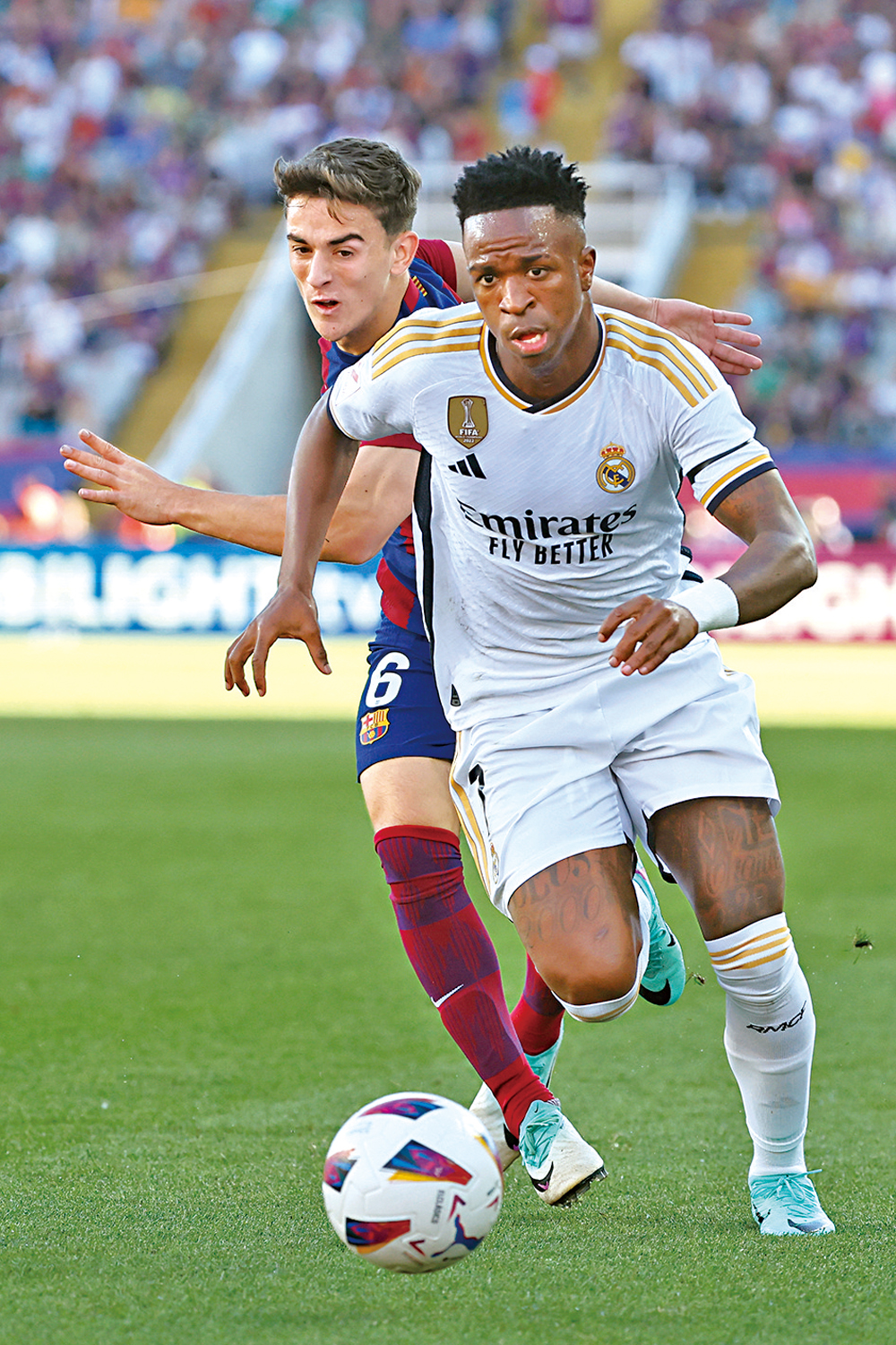 　　圖：雲尼斯奧斯（右）上周六協助皇馬在國家打吡擊敗巴塞隆拿。