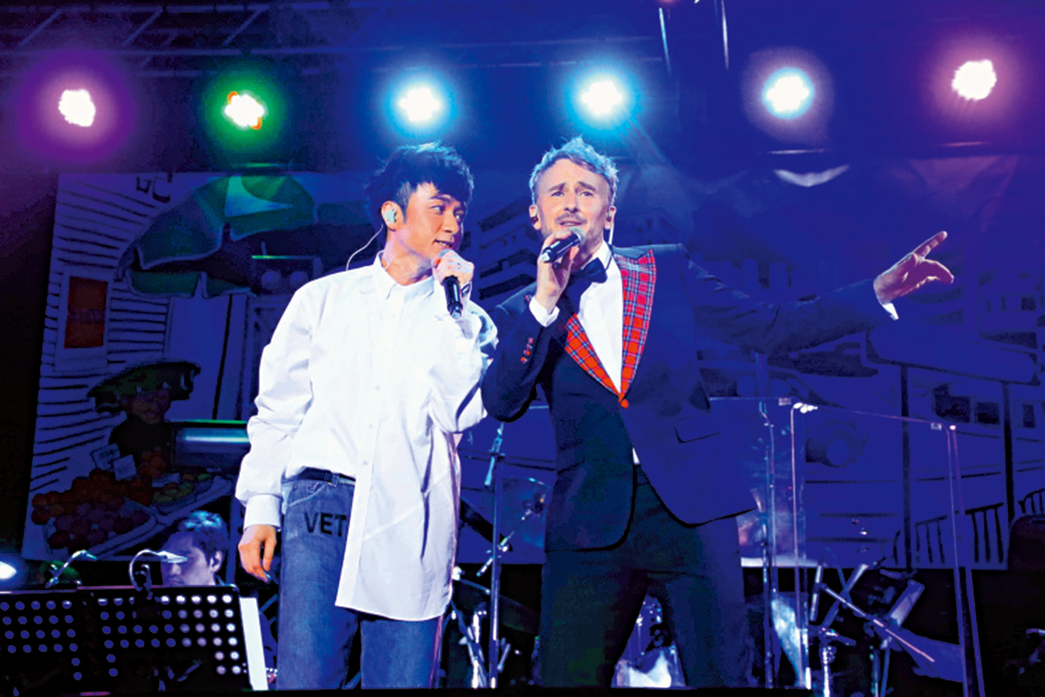 　　圖：河國榮（右）2018年在九展開音樂會，邀請古巨基擔任嘉賓。\資料圖片