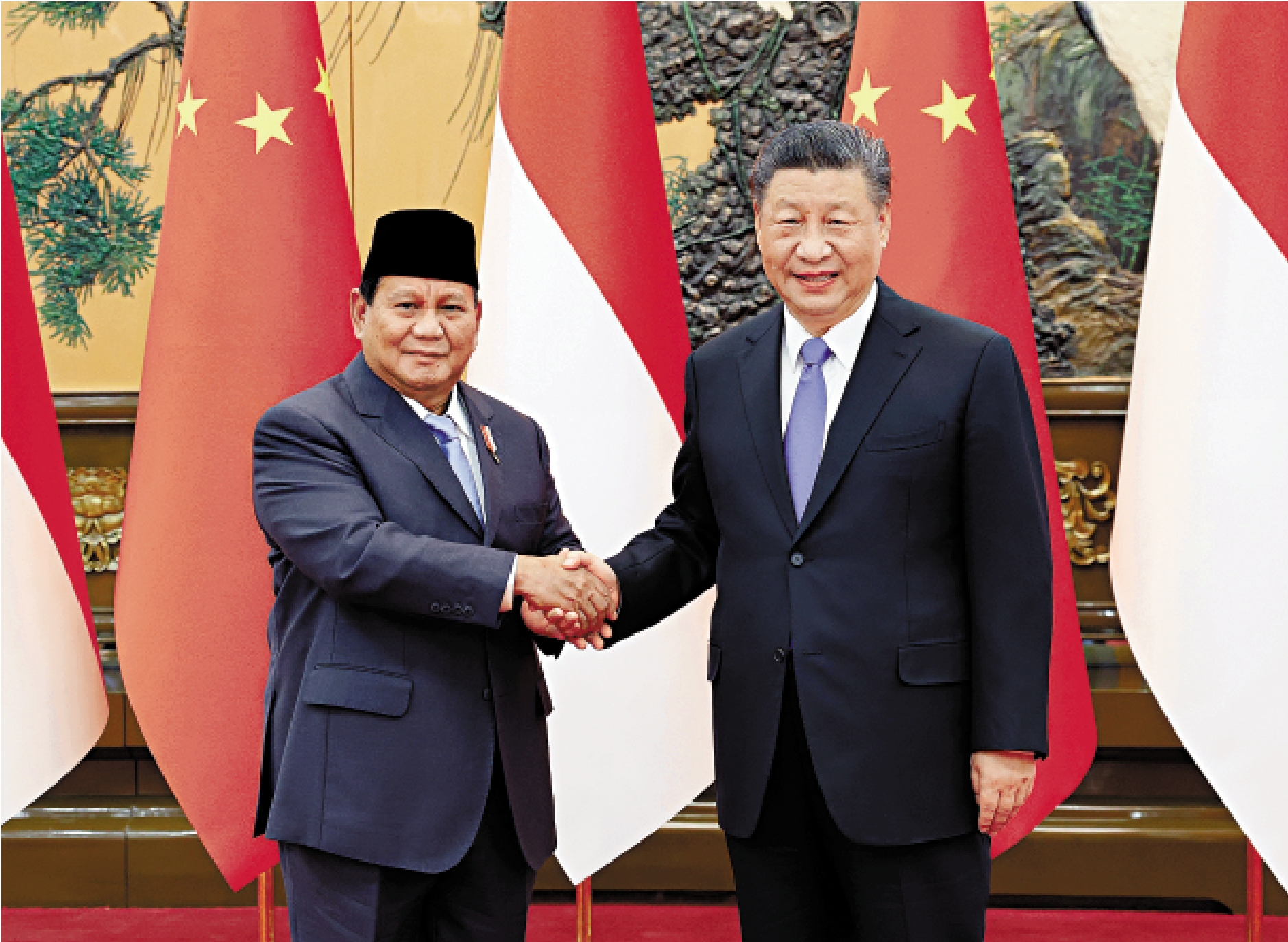 　　圖：4月1日下午，國家主席習近平在北京人民大會堂同印尼當選總統普拉博沃舉行會談。\新華社
