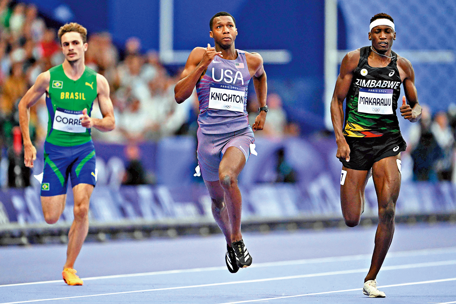 　　圖：美國田徑運動員奈頓（中）7日出戰巴黎奧運男子200米半決賽。\法新社