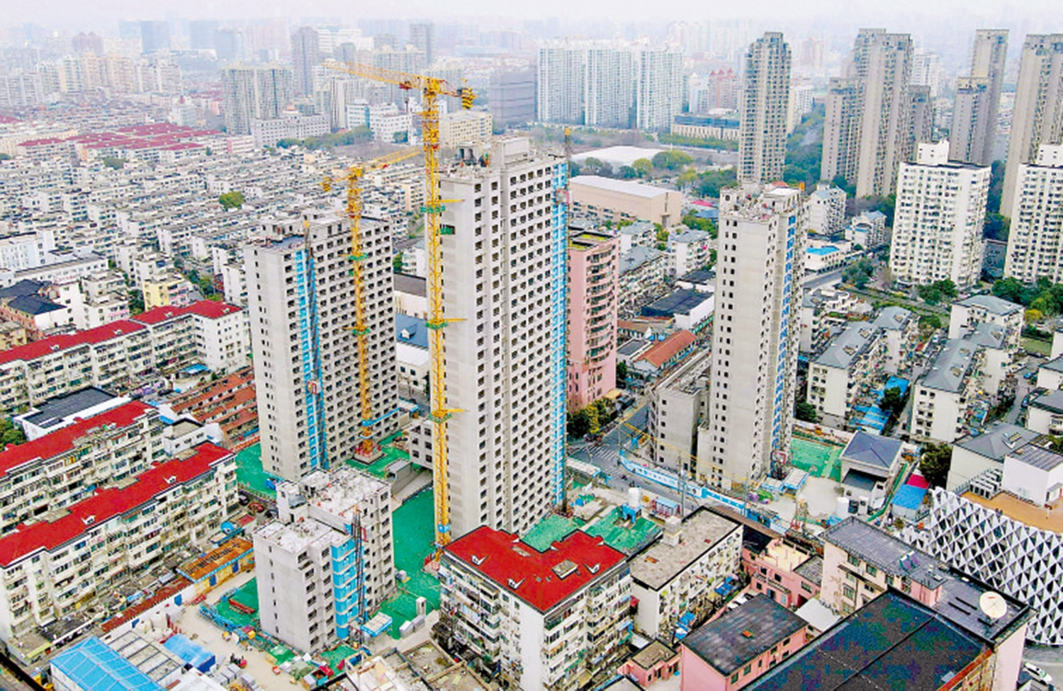 　　圖：內地房地產發展新模式將加快構建。圖為上海一處城市更新項目工地。\新華社