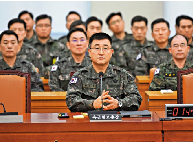 　　圖：韓國前陸軍參謀總長朴安洙（中）。\法新社