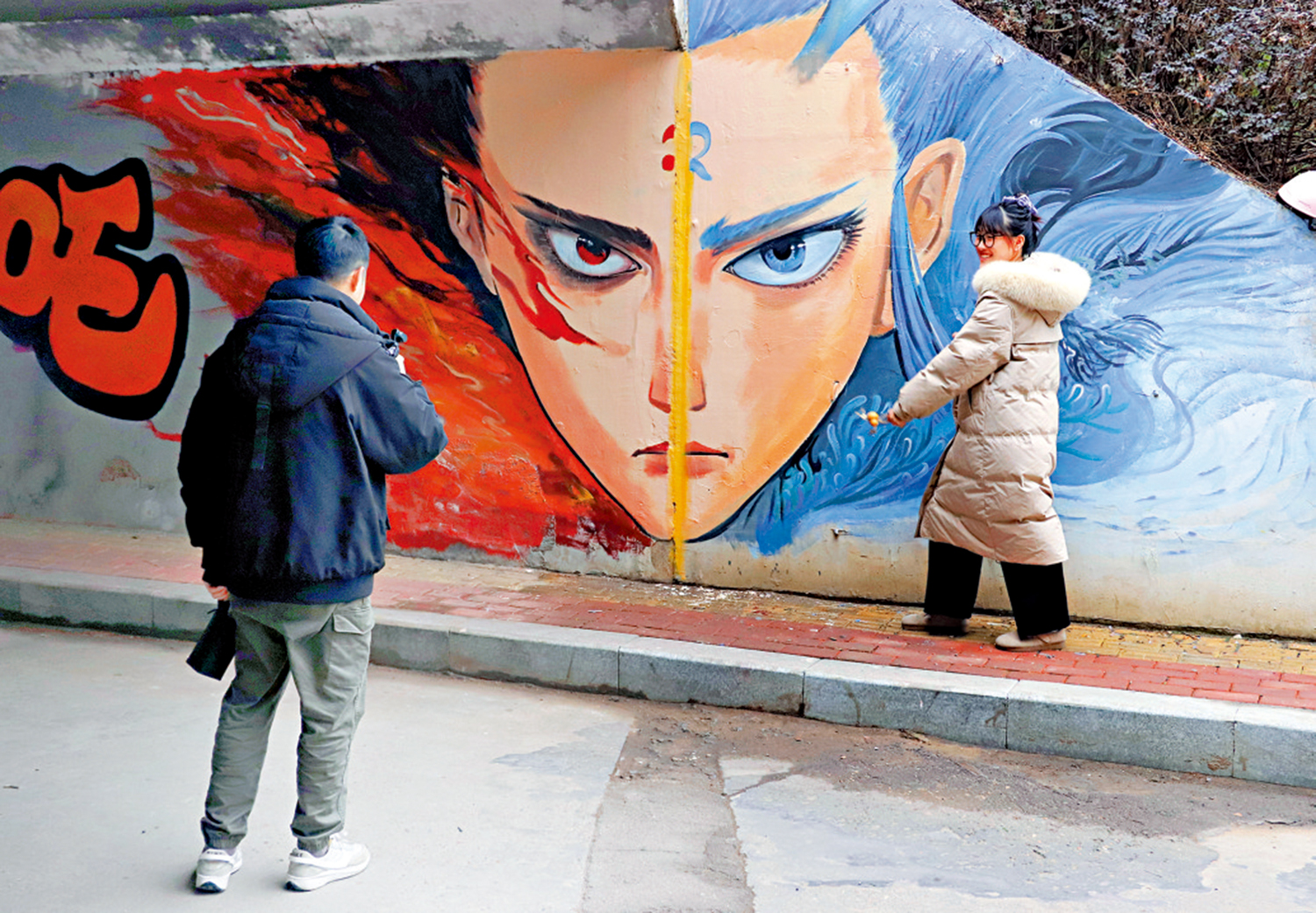 　　圖：江西省南昌市紅谷灘區豐和立交橋下一哪吒主題塗鴉牆走紅網絡，吸引不少市民前來拍照打卡。\中新社