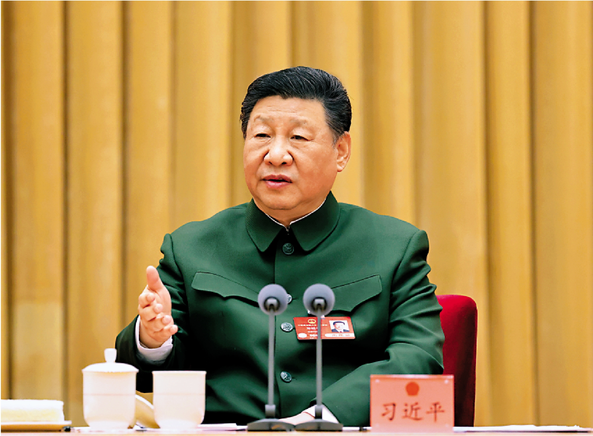 圖:3月7日下午,中共中央總書記、國家主席、中央軍委主席習近平出席十四屆全國人大三次會議解放軍和武警部隊代表團全體會議並發表重要講話。/新華社