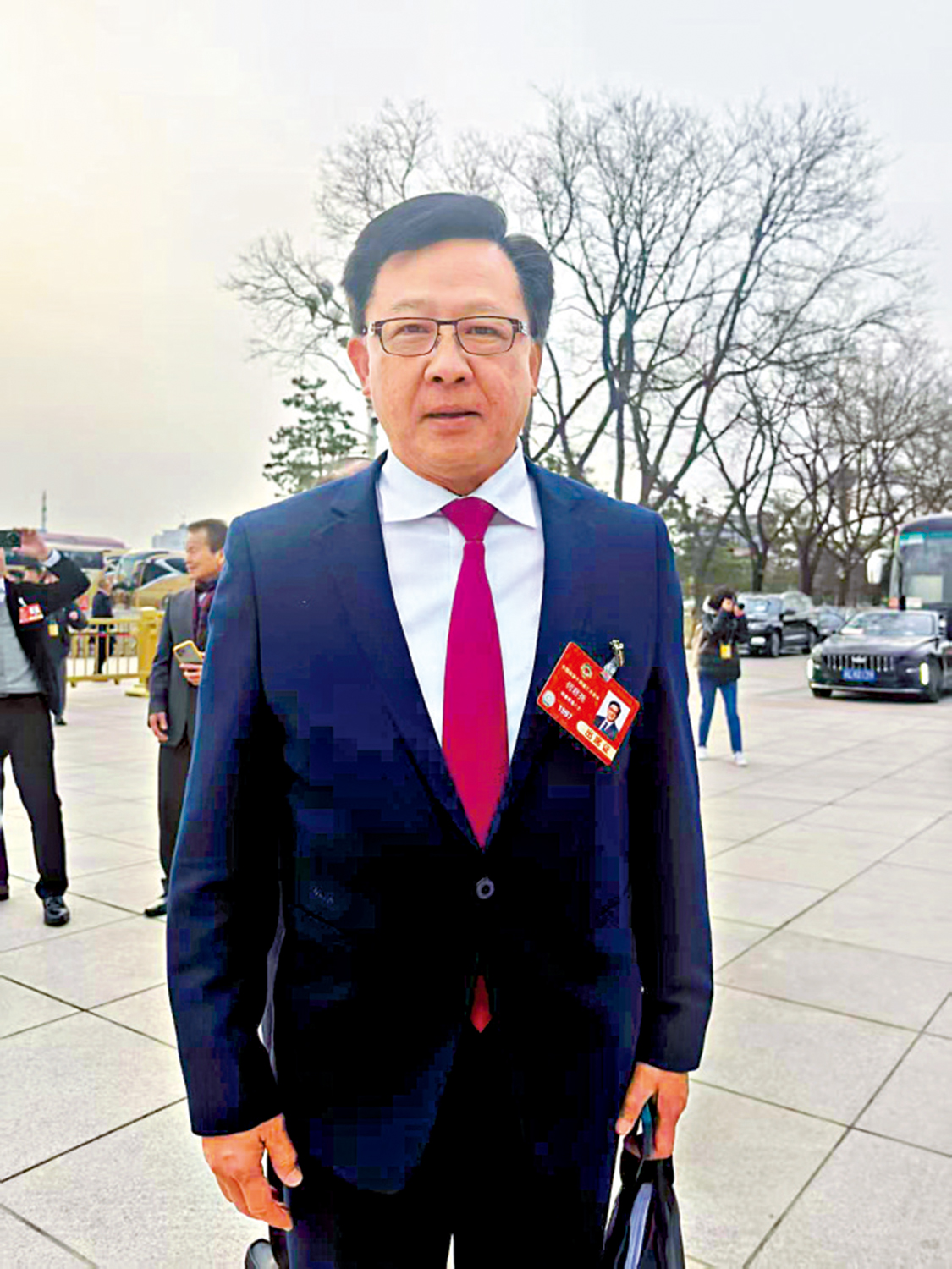 圖:全國政協委員何君堯。