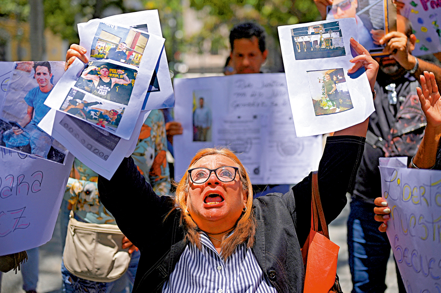 　　圖：被特朗普政府驅逐出境的委內瑞拉移民家屬進行示威。\路透社