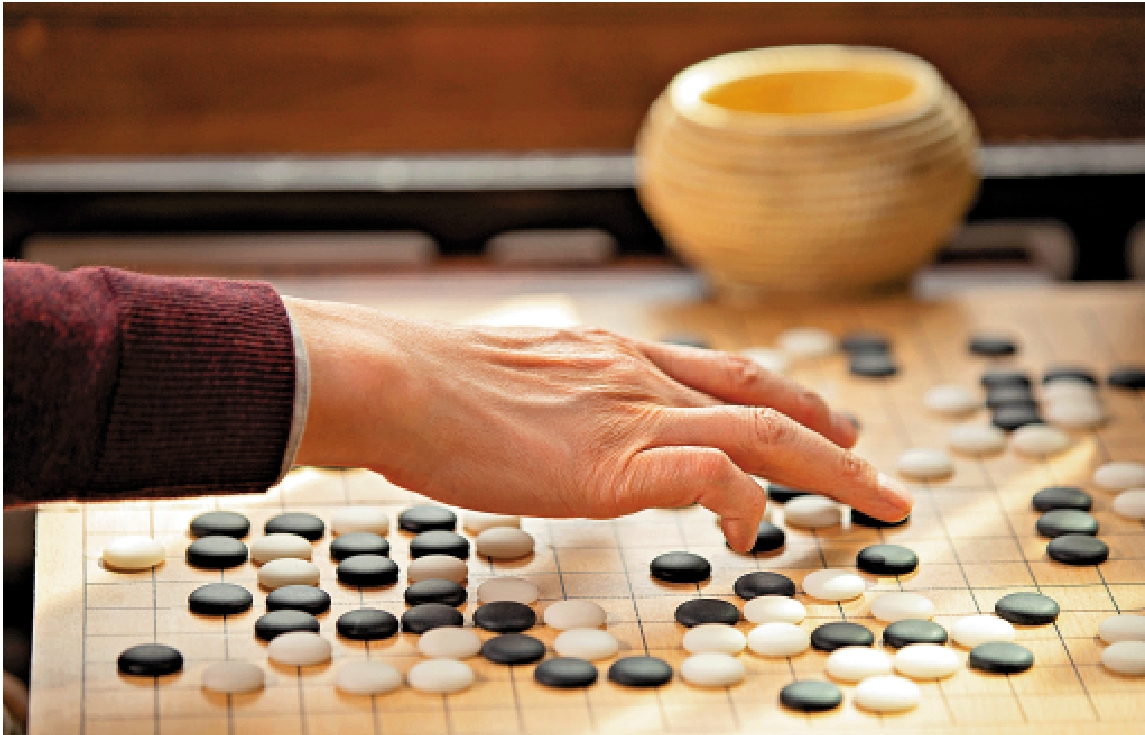 圖:人生如棋,一場博弈。