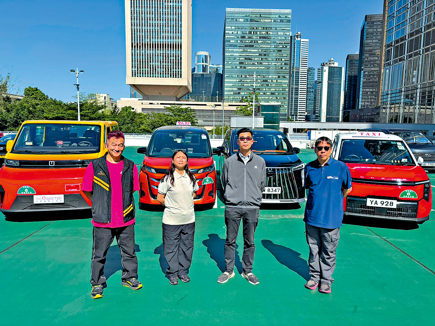 圖:四名的士車隊司機分享工作體驗,表示收入有增長。\大公報記者易曉彤攝