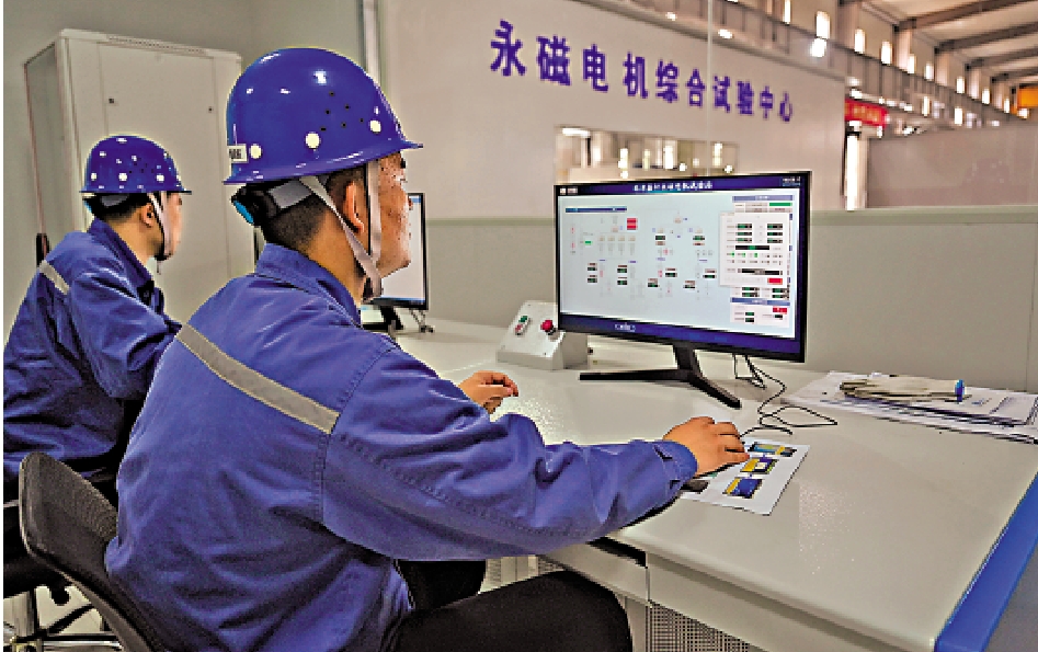 圖:稀土是發展新能源經濟不可或缺的資源。圖為內蒙古包頭市一間永磁電機試驗中心。\新華社