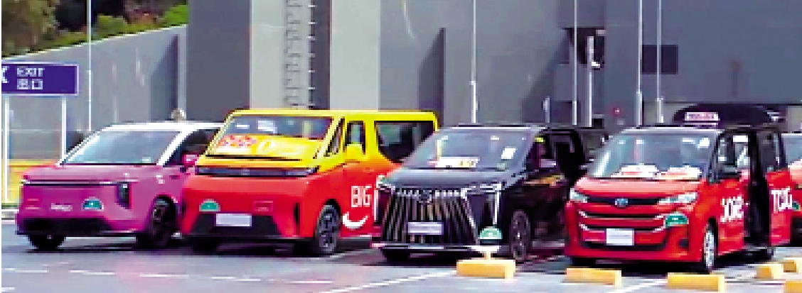 　　圖：政府推動改善的士行業服務，的士車隊下月將獲發牌。