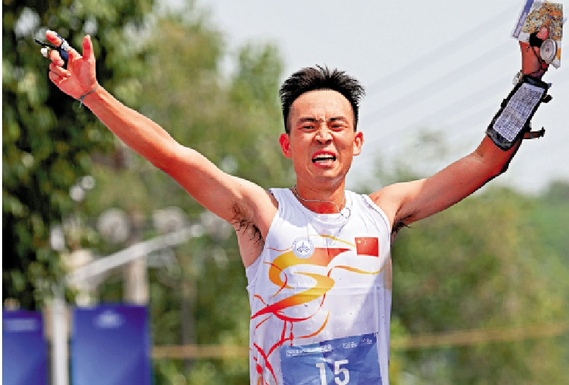 　　圖：中國徒步定向運動員唐建達以第18名完成賽事。\新華社