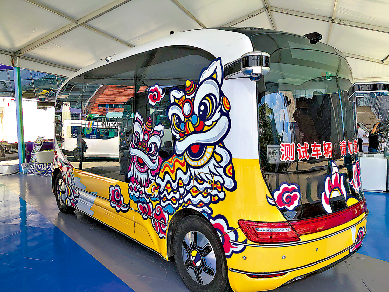 　　圖：無人駕駛巴士將應用於全運會。\大公報記者方俊明攝