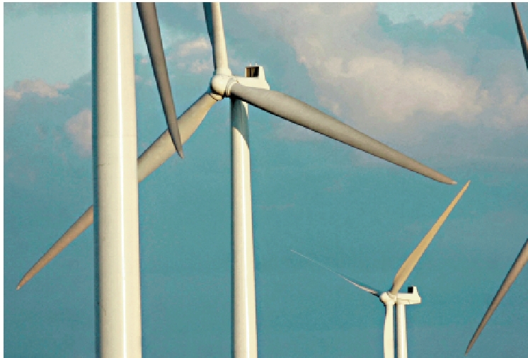 　　圖：紐約州洛維爾市一座農場上的風力渦輪機。\路透社