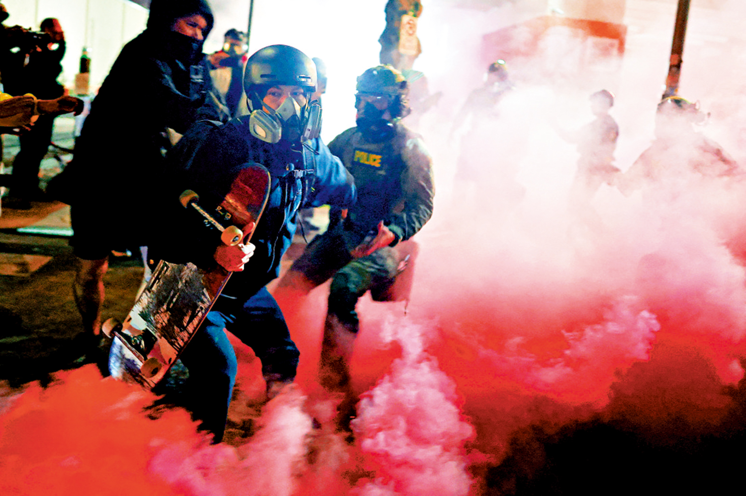 　　圖：反對特朗普移民政策的示威者5日在波特蘭與警方發生衝突。\路透社