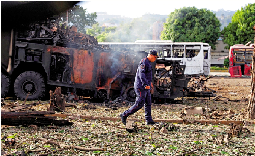 　　圖：委內瑞拉首都加拉加斯的卡洛塔軍事機場遭襲擊後損毀嚴重。\路透社