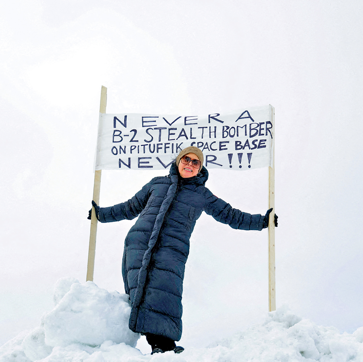 　　圖：格陵蘭島一名示威者反對美軍在該島部署更多武器。\路透社