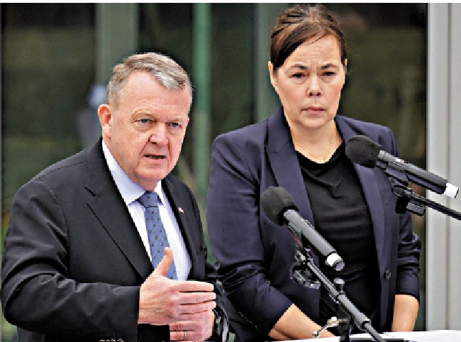 　　圖：14日與美方官員會晤後，丹麥外交大臣拉斯穆森（左）和格陵蘭外長莫茨費爾特見記者。\法新社