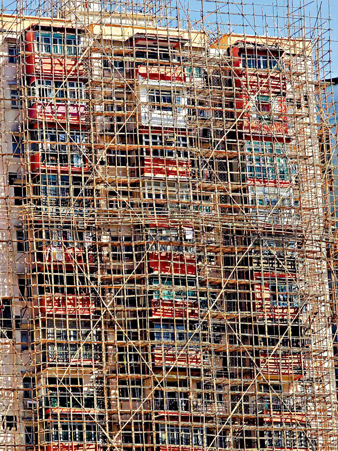 　　圖：當局正進一步優化《建築物管理條例》，加強對大型維修工程等規管。\大公報記者華英明攝