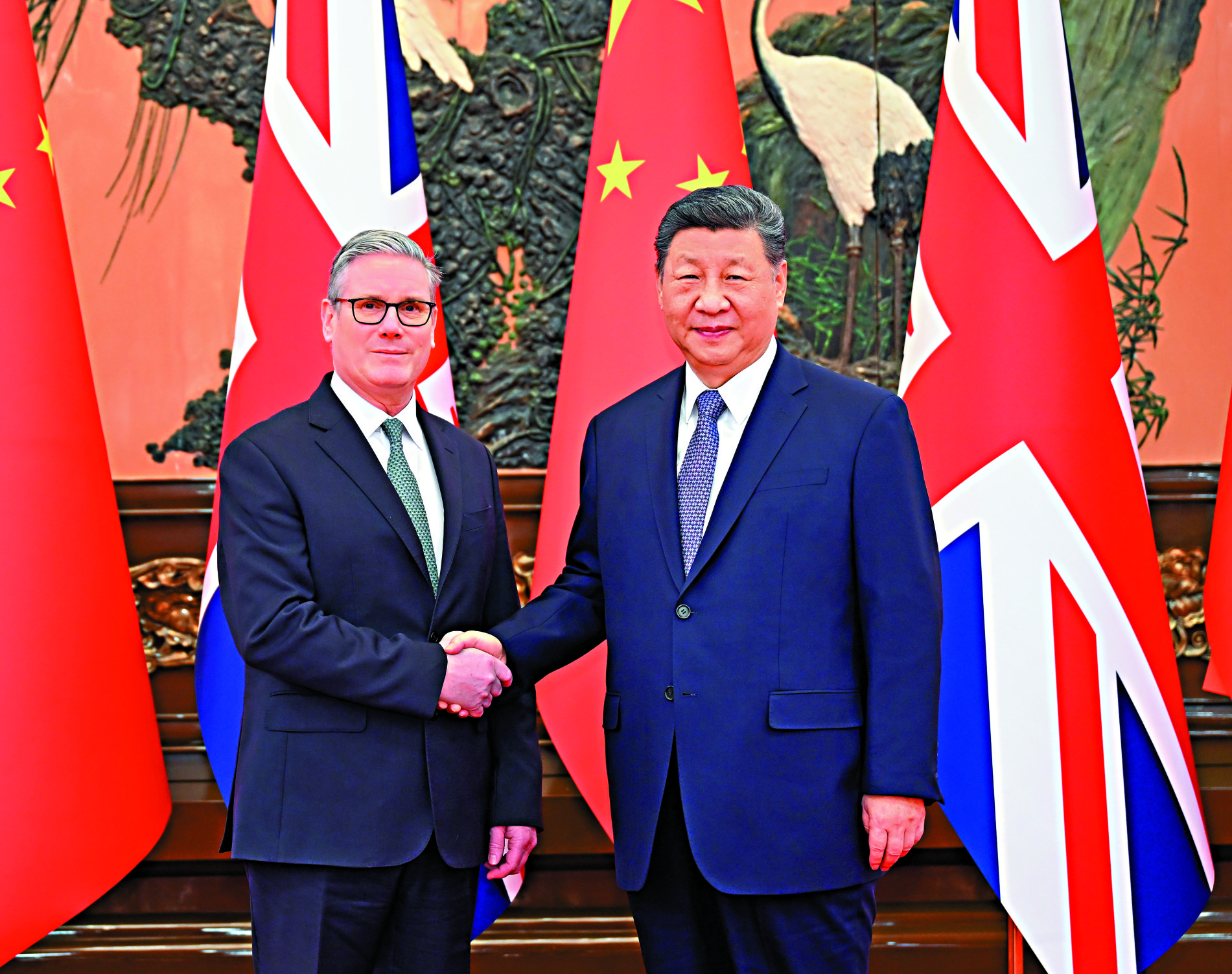 　　圖：1月29日上午，國家主席習近平在北京人民大會堂會見來華進行正式訪問的英國首相斯塔默。\新華社