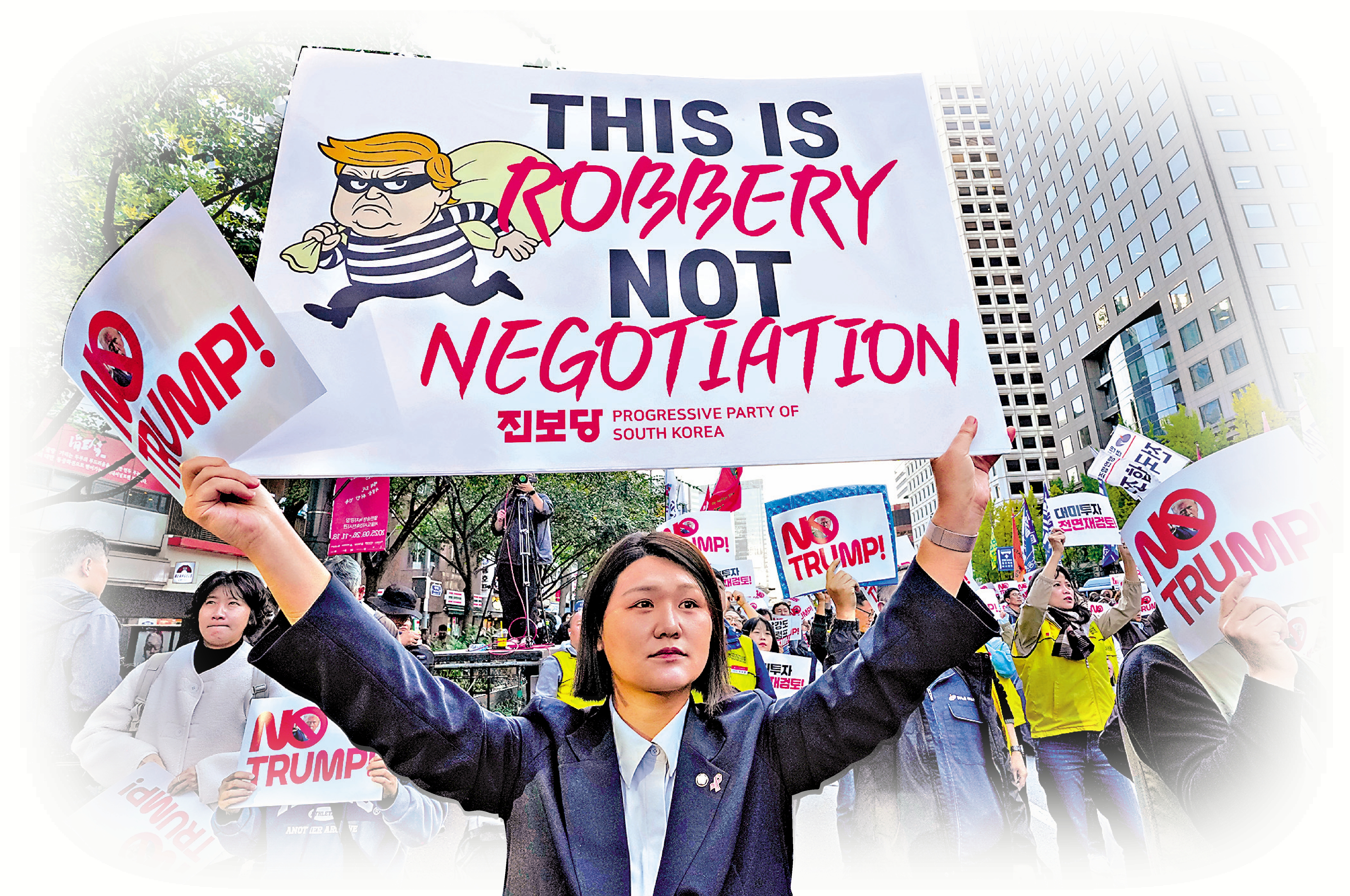 　　圖：韓國民眾集會反對特朗普對韓國徵收關稅。\美聯社