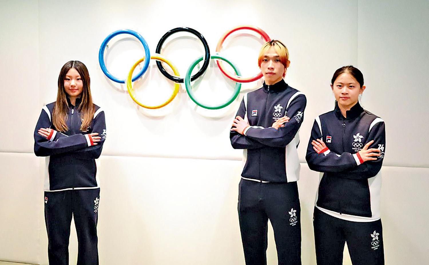 　　圖：右起：林靜欣、郭子峰、金詠晞昨出席記者會。另一港團選手翁厚全則已抵意大利備戰。\大公報記者朱家立攝