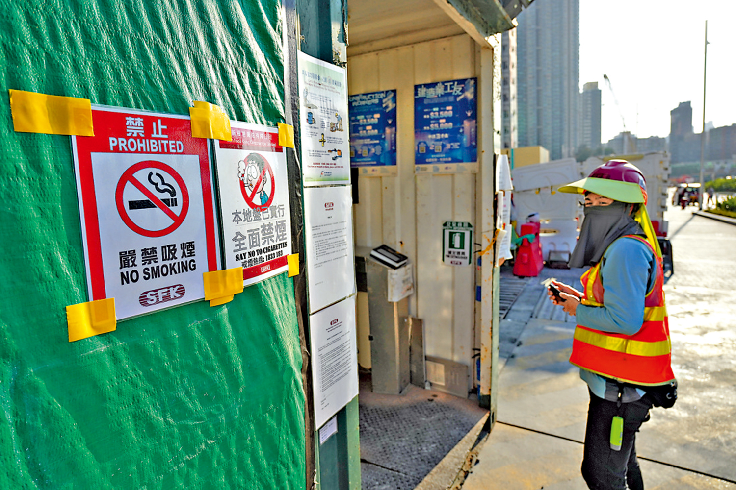 　　圖：勞福局表示，政府計劃將地盤全面禁煙最高十五萬元罰款改為定額罰款三千元。