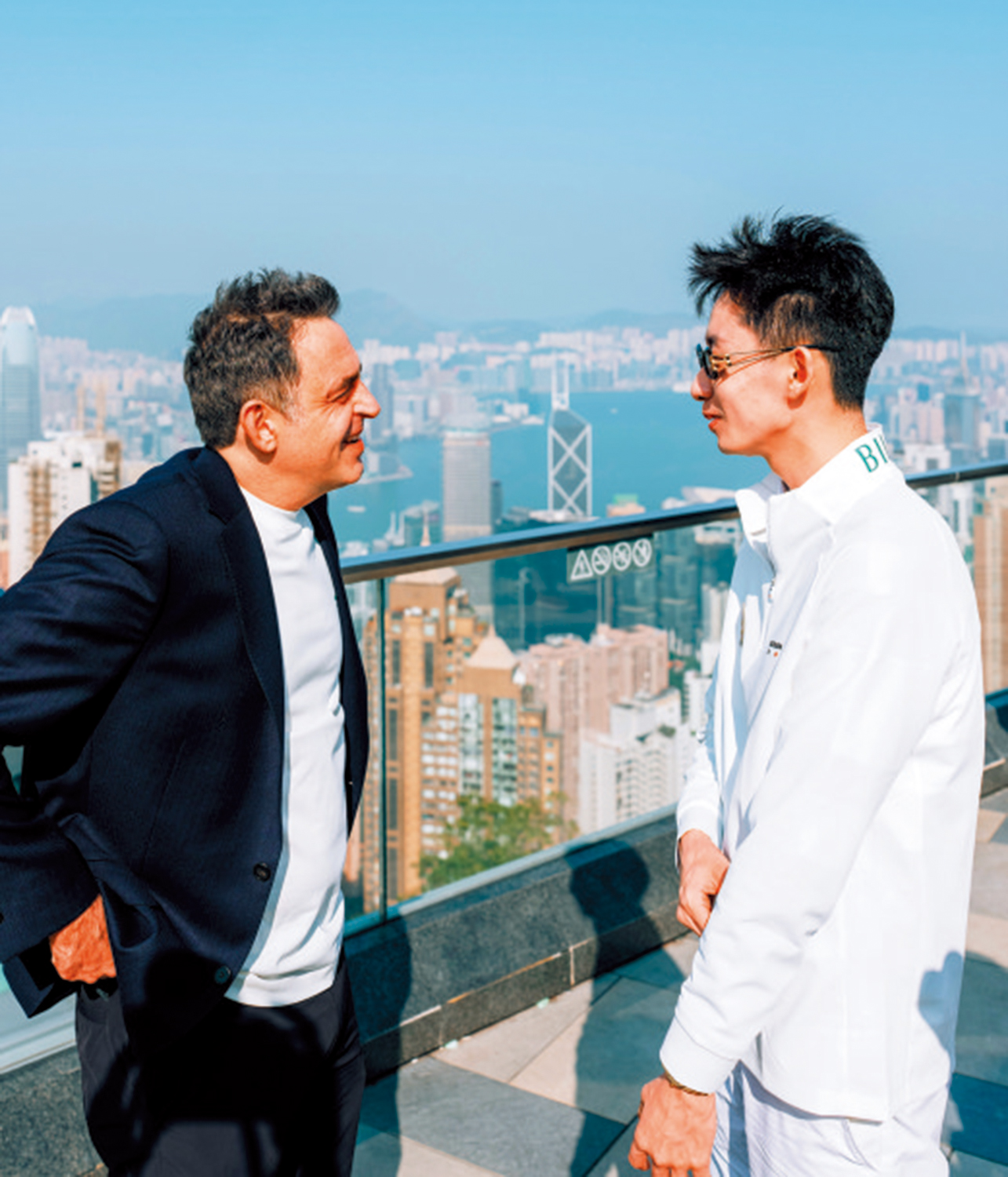 　　圖：奧蘇利雲（左）與吳宜澤（右）賽前出席活動。