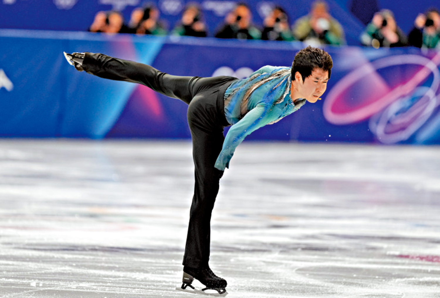 　　圖：花樣滑冰團體賽男子單人滑短節目比賽在意大利米蘭舉行。中國隊選手金博洋在比賽中。\新華社