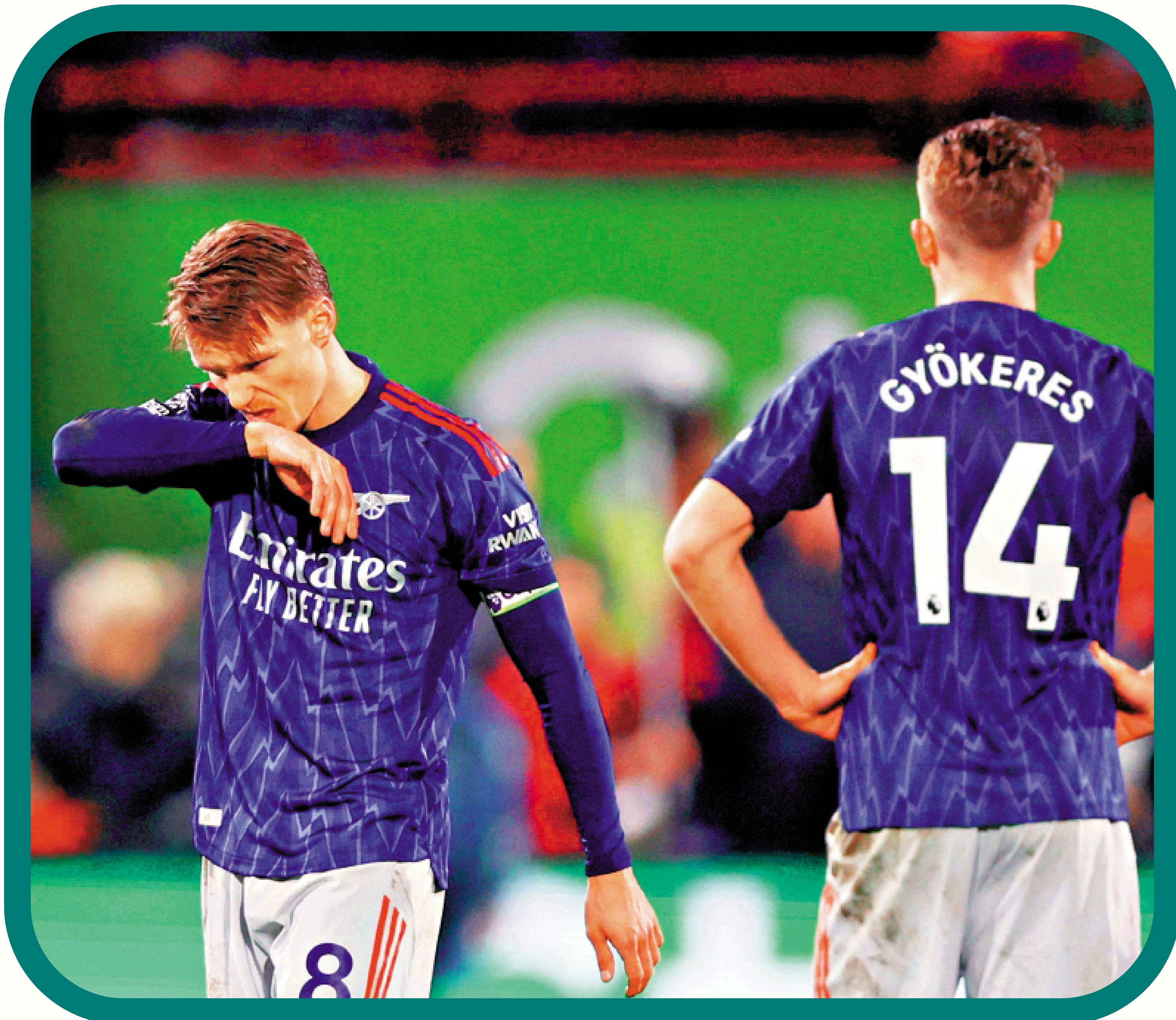 　　圖：阿仙奴的奧迪加特（左）在賽後一臉失望。\路透社