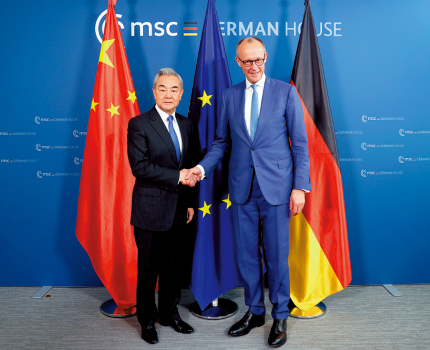 　　圖：2月14日，德國總理默茨在慕尼黑會見王毅。\新華社