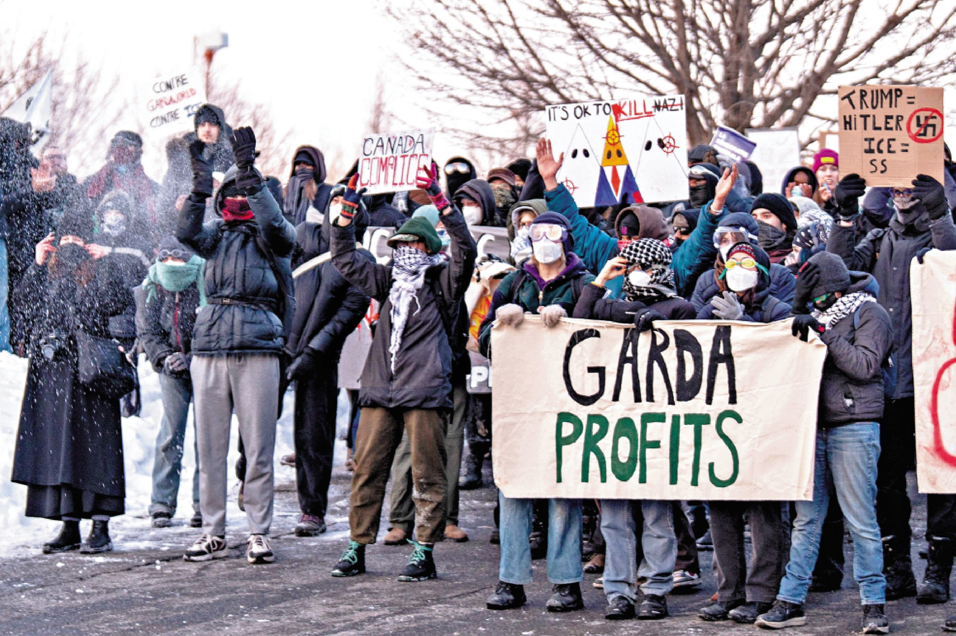 　　圖：加拿大民眾13日示威，抗議當地一家安保公司與特朗普政府合作。\法新社
