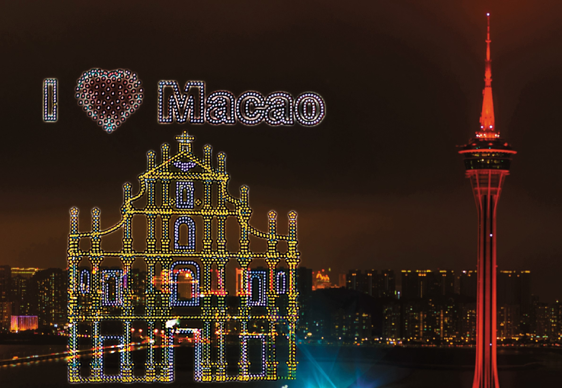 　　圖：二月二十三日，澳門新春第二場無人機煙花匯演在旅遊塔對出海面上演。\香港中通社