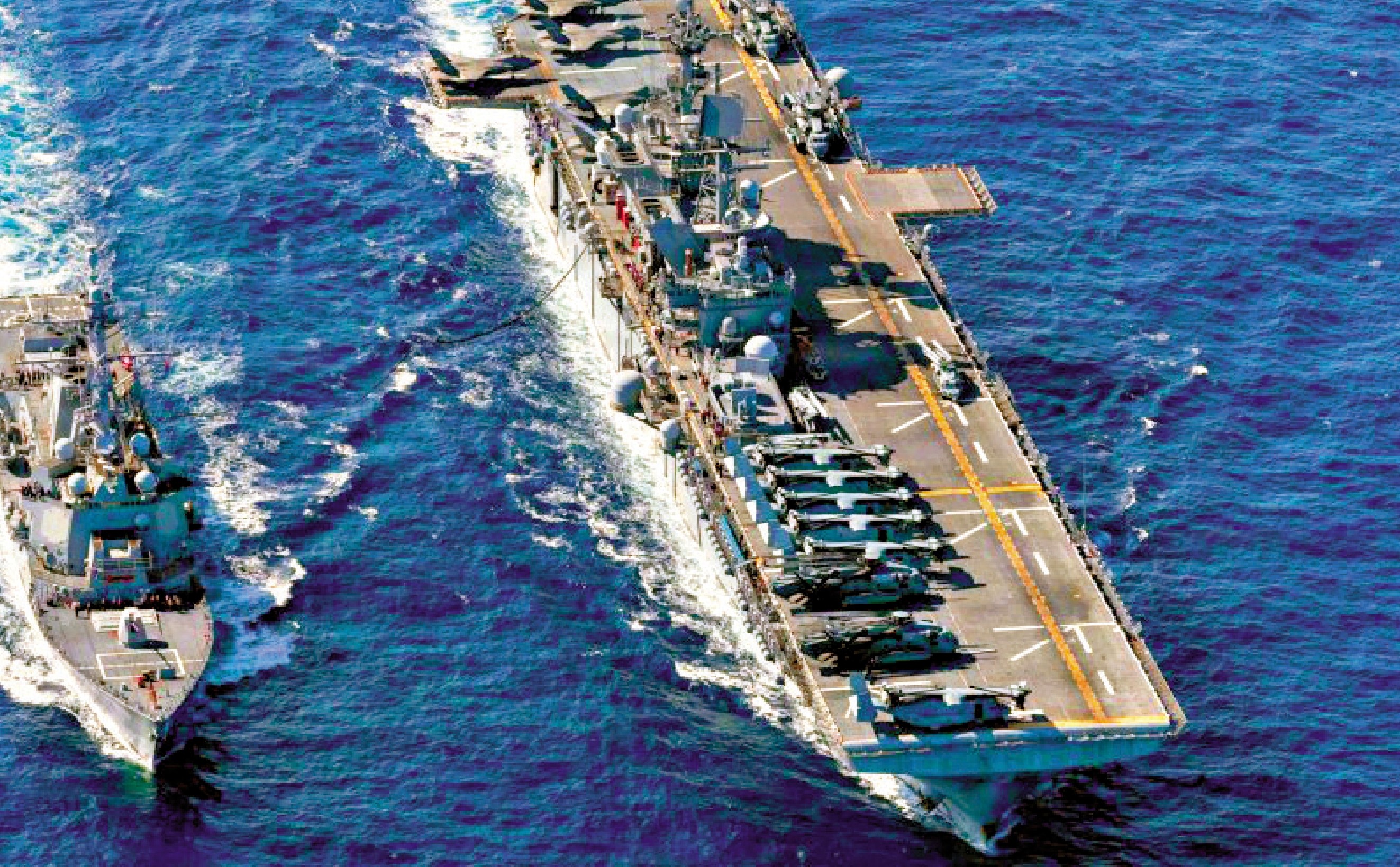 　　圖：「的黎波里」號兩棲攻擊艦（右）被派往中東。\網絡圖片