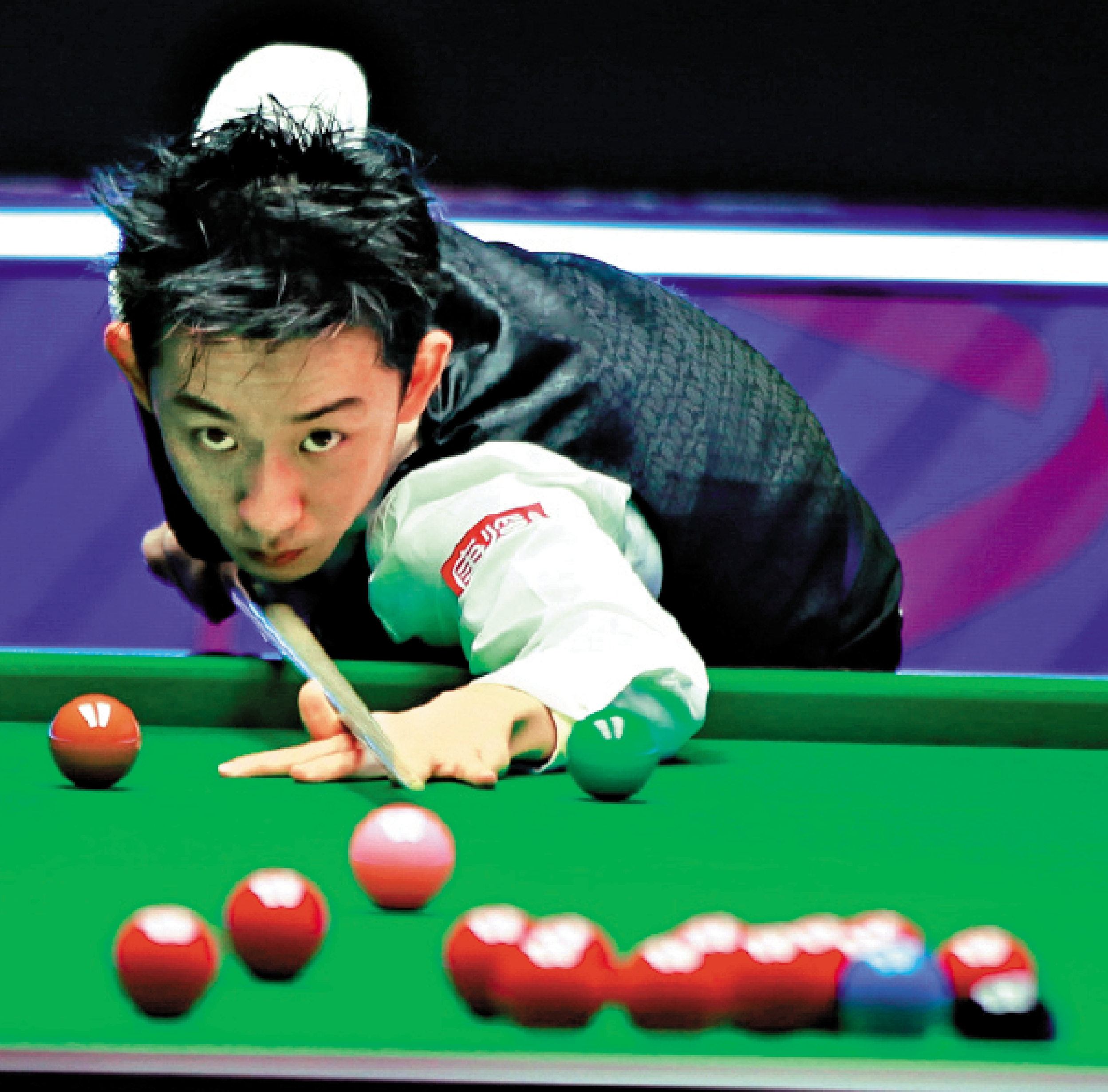 　　圖：吳宜澤在比賽中力拚。