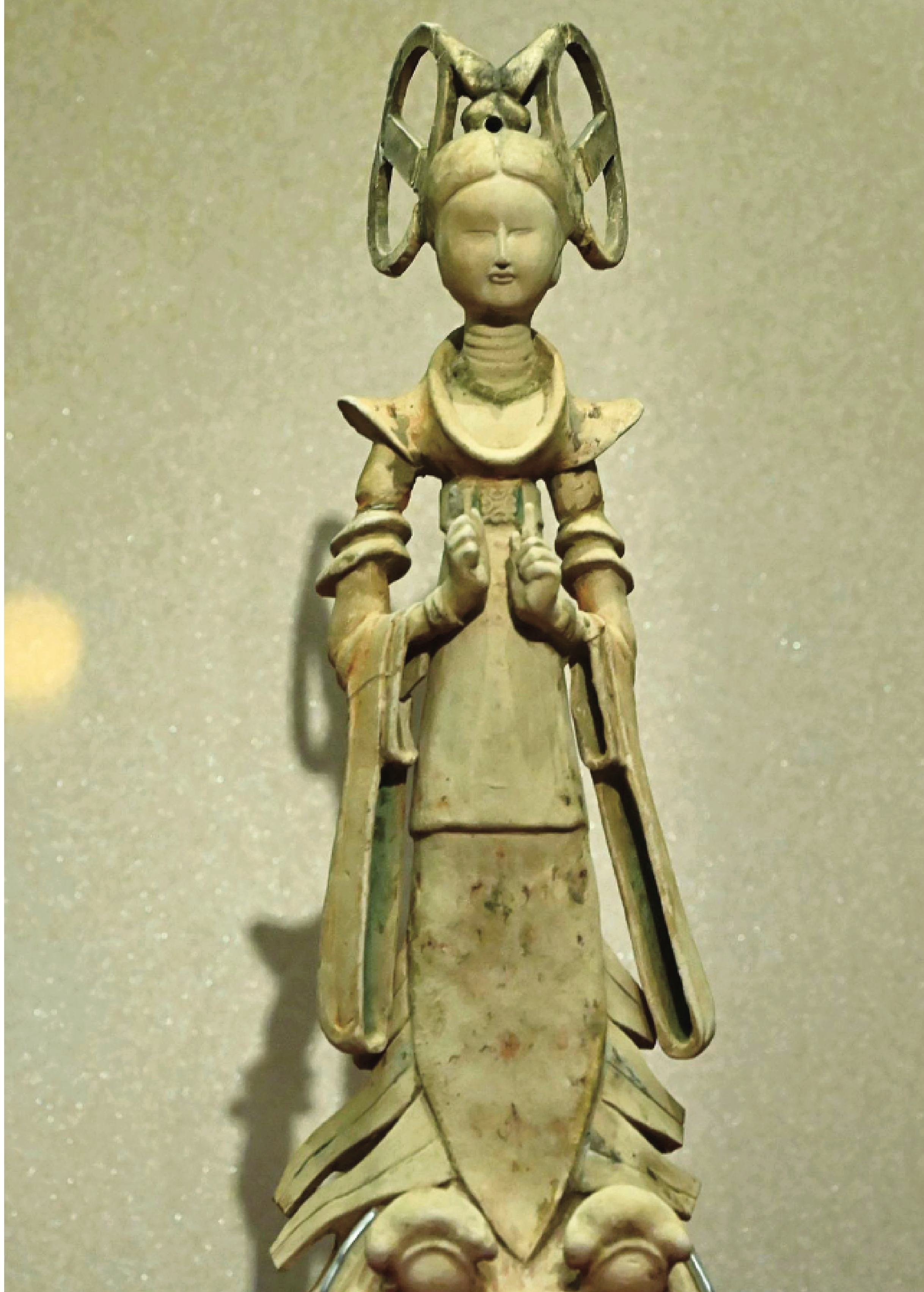 　　圖：「長安萬象」展出的彩繪雙環望仙髻女舞俑。