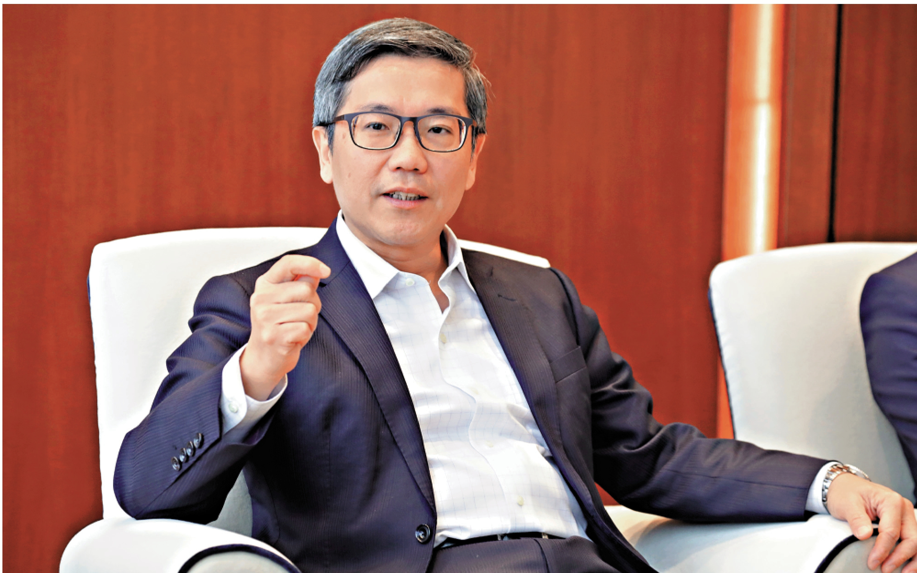 　　圖：阮國恒表示，強制性背景查核計劃的背景查核，不止於銀行業。