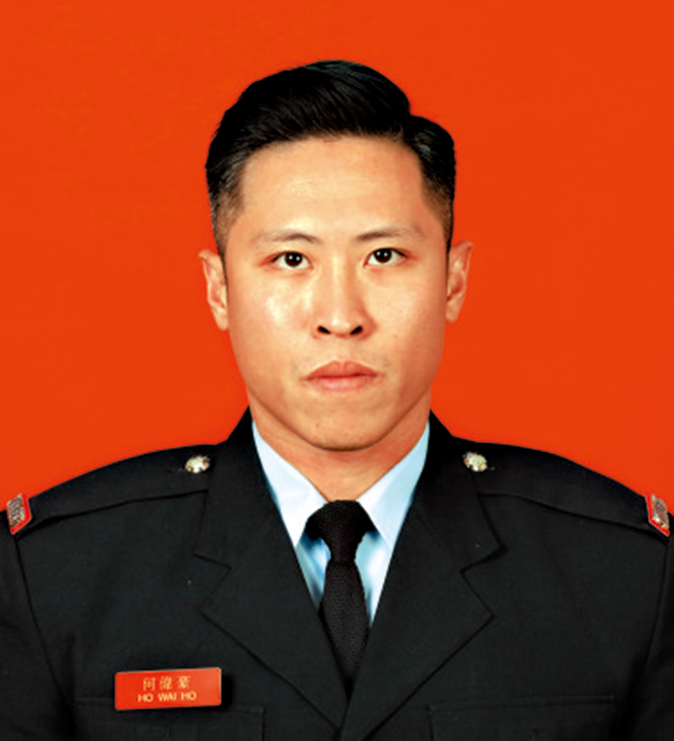　　圖：殉職消防隊目何偉豪。