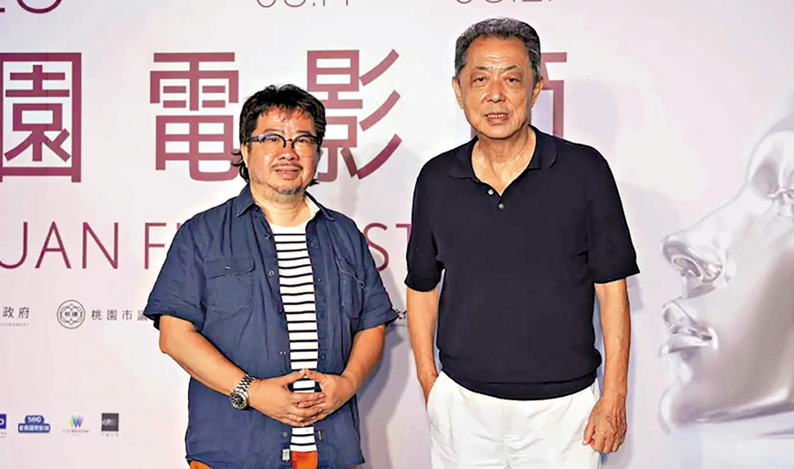 　　圖：電影《給阿嬤的情書》在台展映，知名導演朱延平（右）與台灣影視聽中心董事長褚明仁共同出席首映活動。\中通社