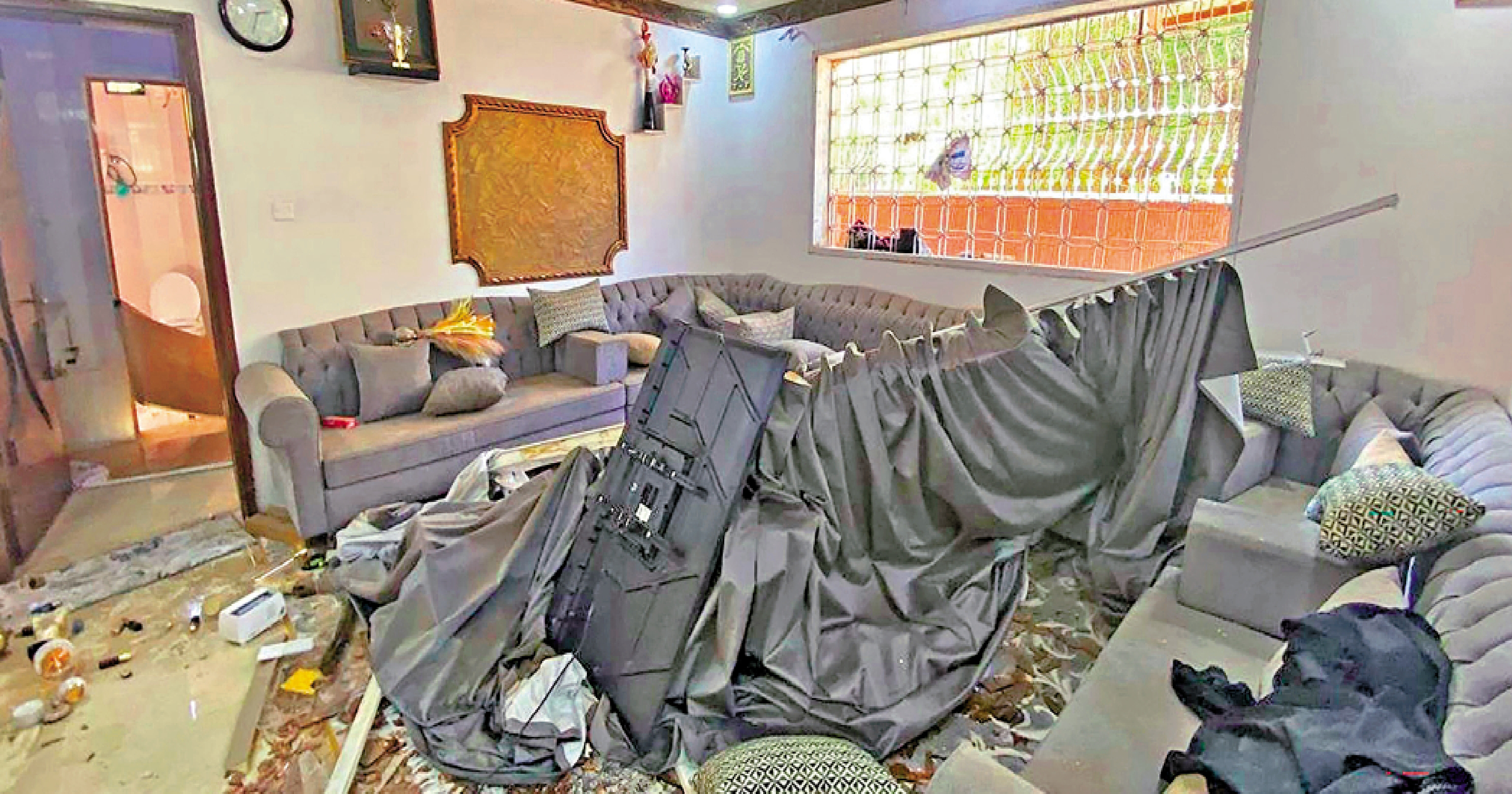 　　圖：沙特方面18日公布一間公寓遭胡塞武裝空襲的畫面。\法新社