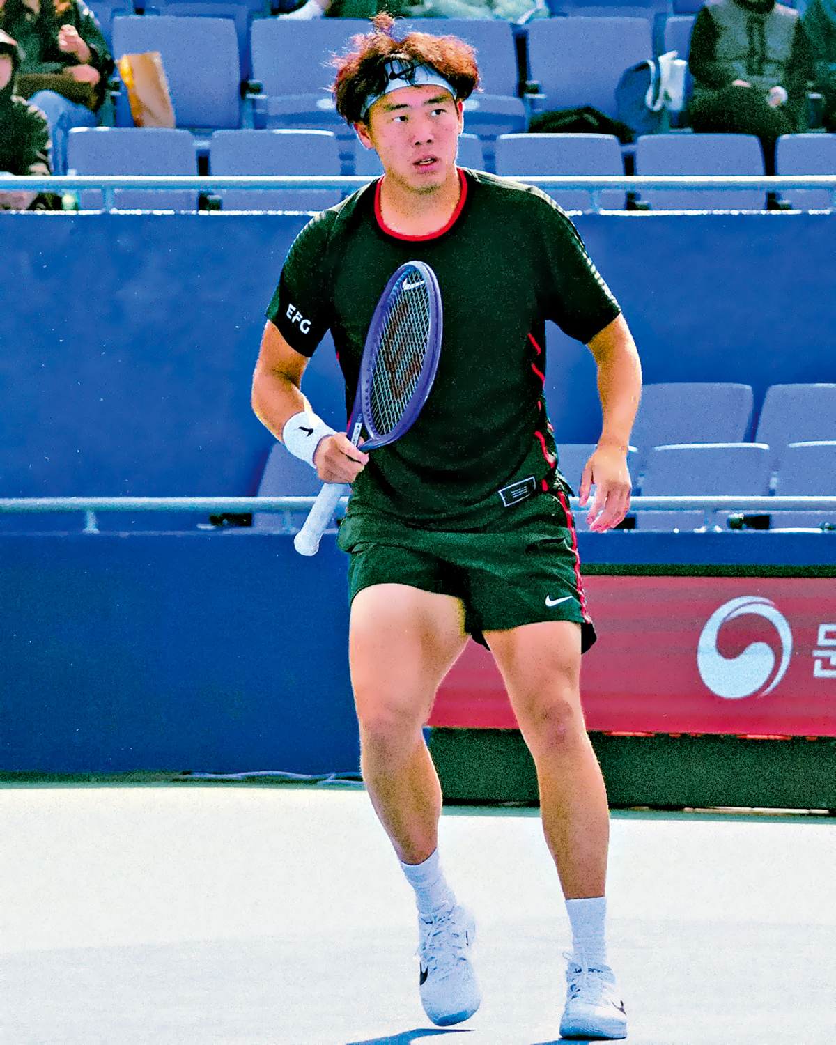 　　圖：黃澤林於8強賽以總盤數2：0擊敗日本球手島袋將。\ATP圖片