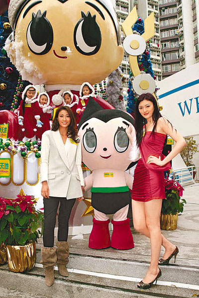 　■名媛陳君宜(左)與名模徐靖雯出席「Moderno小飛俠阿童木」登場儀式。