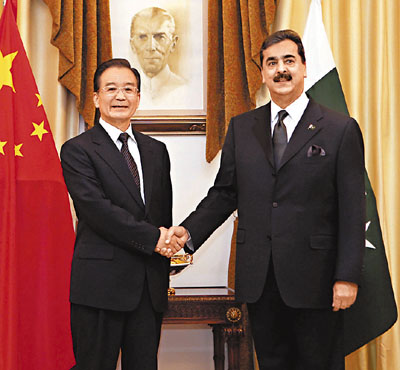 　■溫家寶在伊斯蘭堡與巴基斯坦總理吉拉尼舉行會談。    	新華社