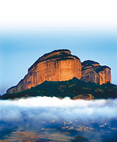 　■廣東丹霞早前成功申遺。圖為廣東丹霞山姊妹峰。資料圖片