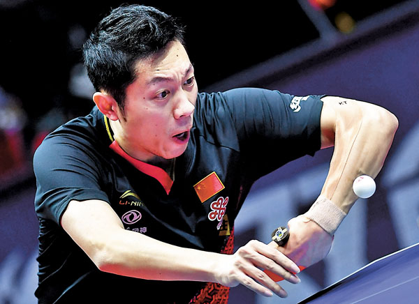 ■ 許昕與臨時搭檔孫穎莎打出火花，奪混雙冠軍。 資料圖片