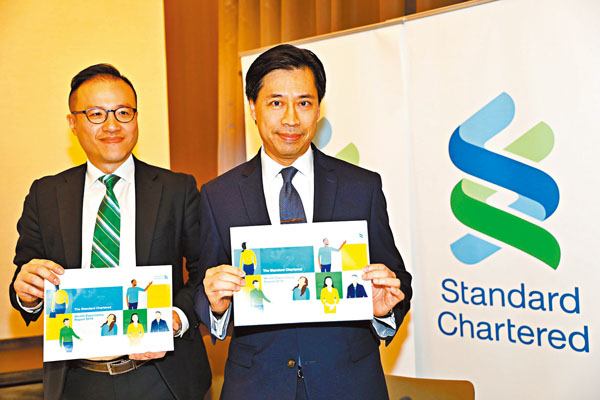 ■渣打香港昨公佈《財富預期報告2019》,左為梁振輝、右為鄭浩洋。香港文匯報記者 攝