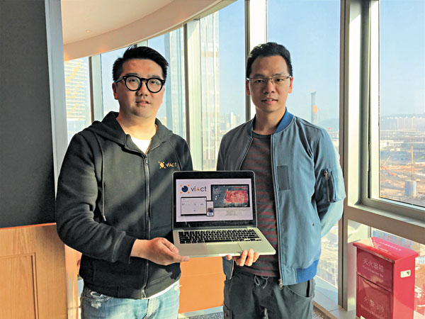 ■伍震駒（右）和卓遠恆團隊研發出亞洲首個建築專用AI雲端平台viAct.ai。 香港文匯報記者敖敏輝  攝
