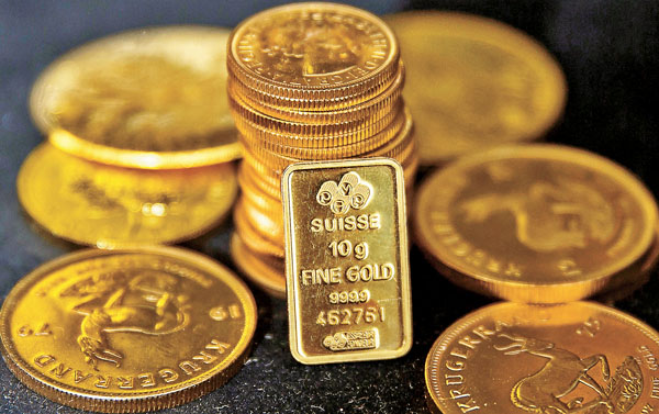 ■ 市場擔憂環球經濟增長因疫情減慢，加上主要央行維持寬鬆政策，給金價帶來支持，國際金價突破1,600美元水平。 資料圖片