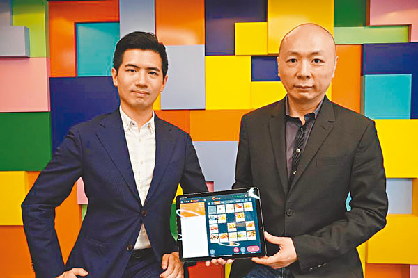 ■李維聰(右)表示,Eats365網上點餐平台對餐廳收費低廉,使其有更大盈利和減價空間。