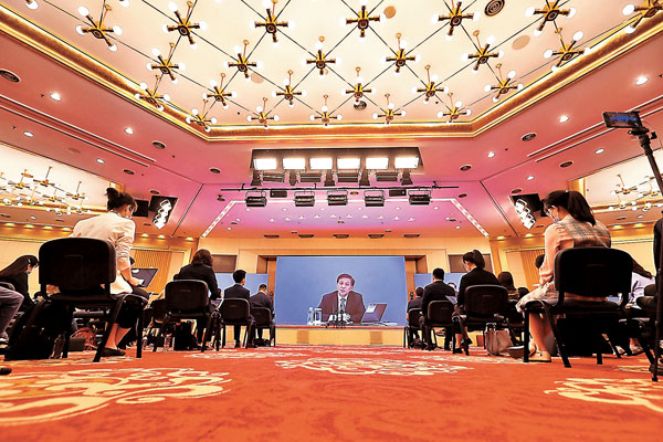 ■十三屆全國人大三次會議新聞發佈會在北京人民大會堂新聞發佈廳舉行，由大會發言人張業遂就大會議程和人大工作相關問題回答中外記者提問。 美聯社